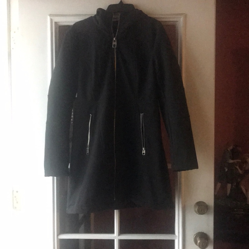 Woman’s black coat